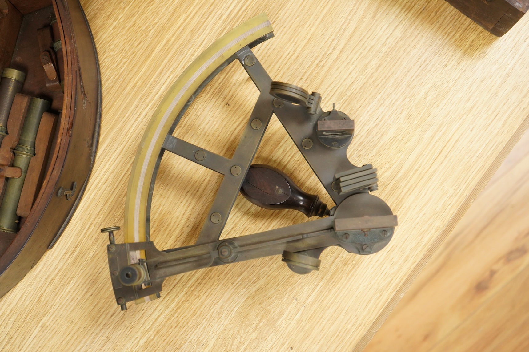 A mid 19th century brass and lacquered double frame sextant, by Troughton & Sims, London, number 2367, the mahogany case containing four interchangeable sighting telescopes, two eyepieces and an adjusting key